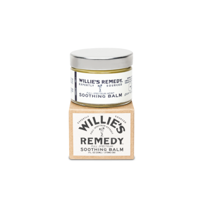Willie Nelson's Willie's Remedy Soothing CBD balm jar on top of box