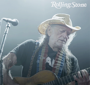 Willie Nelson playing guitar from Rolling Stone Magazine Article