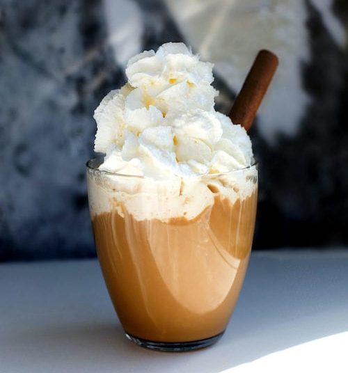 CBD coffee cocktail with whiskey, almond liqueur and whipped cream